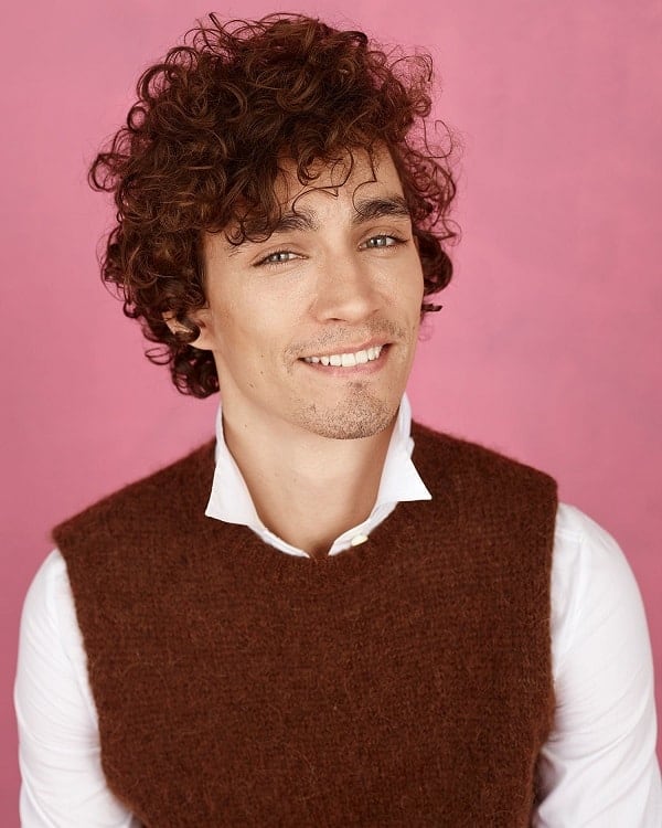 Simple Short Curly Hair Male Actor for Simple Haircut