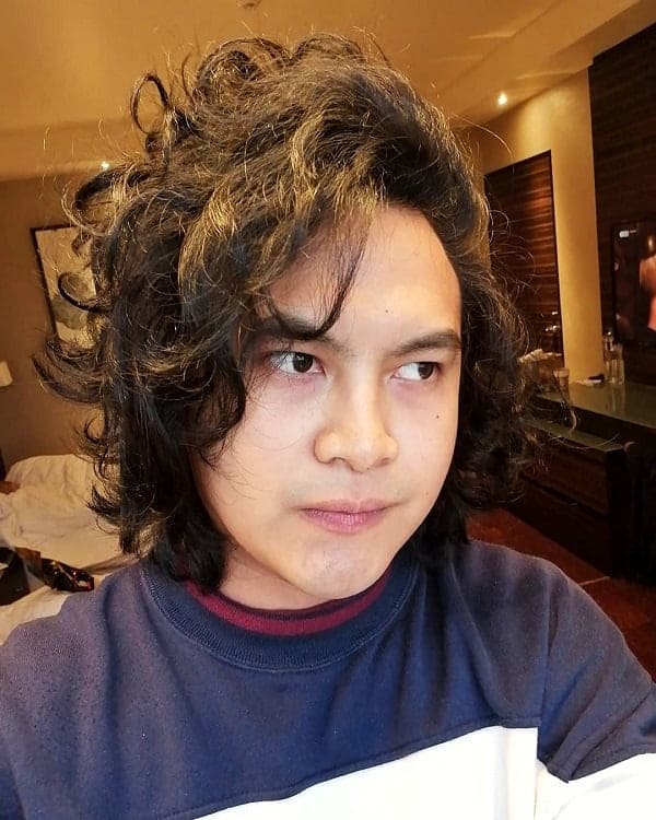 Asian Guy with Long Wavy Hair