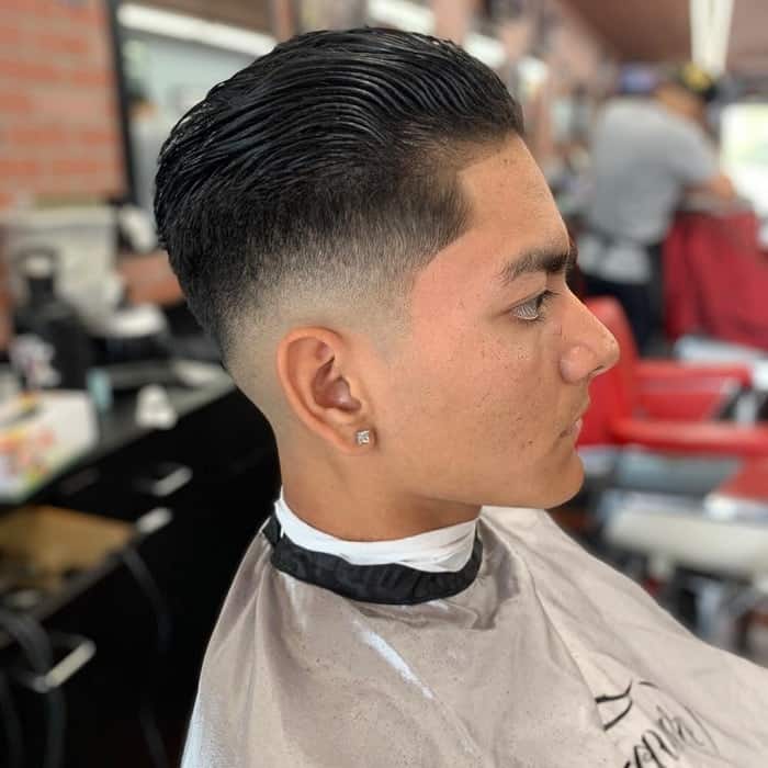 Slicked Back Hair with Skin Taper Fade  