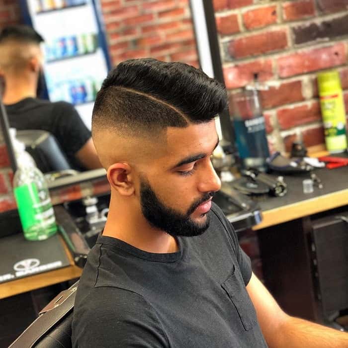 Medium Skin Fade Haircut with Hard Part 