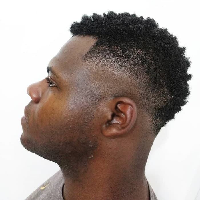 short afro mohawk with bald fade 