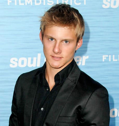 Image of Alexander Ludwig with hair pulled to the right side.