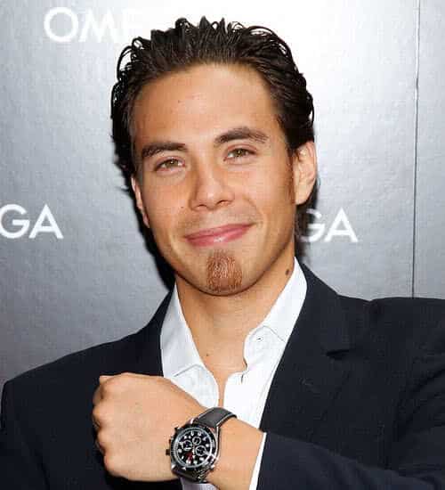 Picture of Apolo Anton Ohno swept back hairstyle.