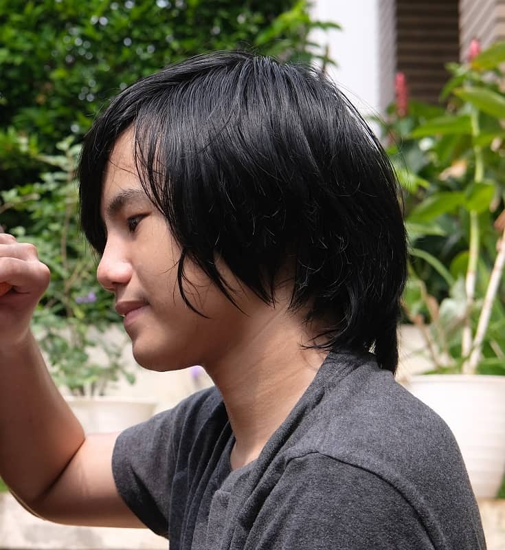 Asian teen boy with long hair