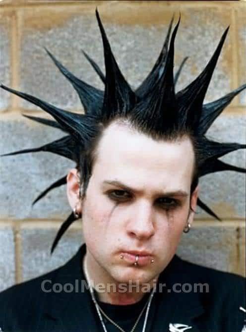 Photo of Benji Madden Liberty spikes hairstyle.