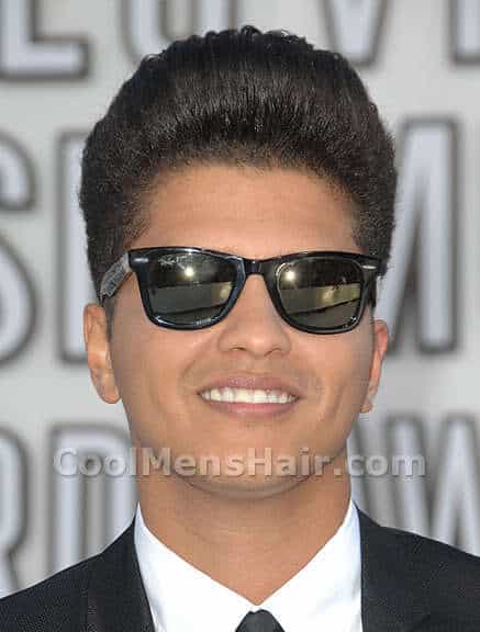 Photo of Bruno Mars pompadour hairstyle.