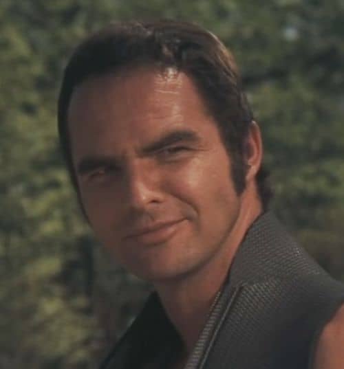 Picture of Burt Reynolds short hairstyle.