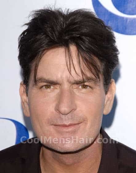 Picture of Charlie Sheen middle part hairstyle.