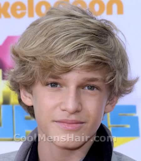 Cody Simpson blonde side bangs hair style.