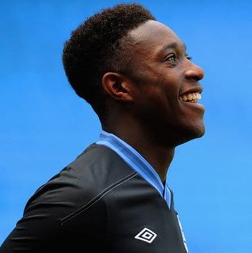 Photo of the side view of Danny Welbeck high top fade hairstyle.