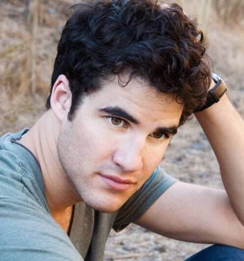 Image of Darren Criss curly hairstyle.