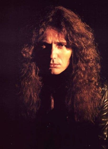 Photo of David Coverdale hairstyle.