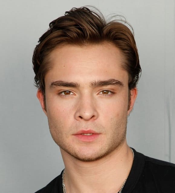 Photo of Ed Westwick flipped back hairstyle.