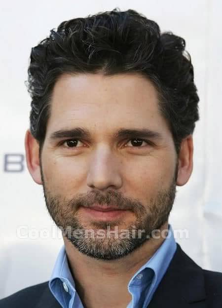 Picture of Eric Bana short curly hairstyle.