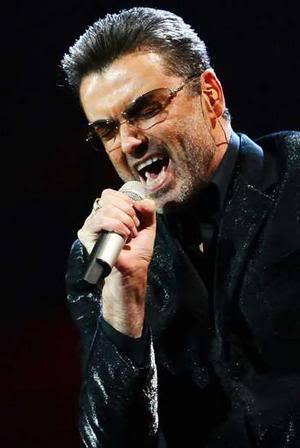 Image of George Michael slick back hairstyle.