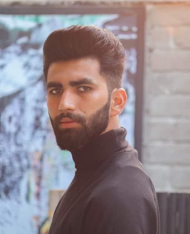 Image of Side part hairstyle for oval face shape men with beard