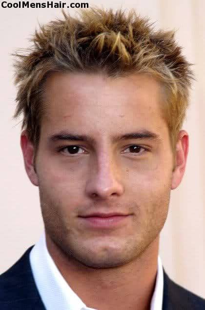 Photo of Justin Hartley spiky blonde hairstyle. 