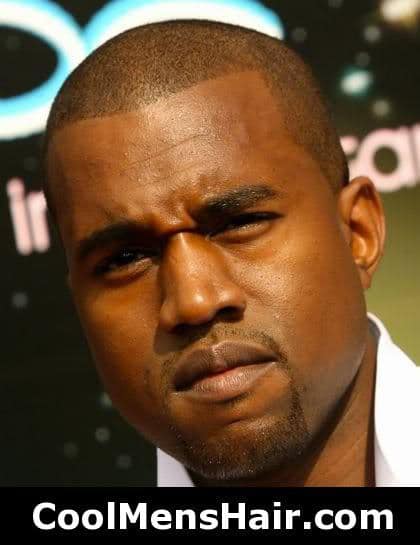 Photo of Kanye West buzz cut hairstyle.