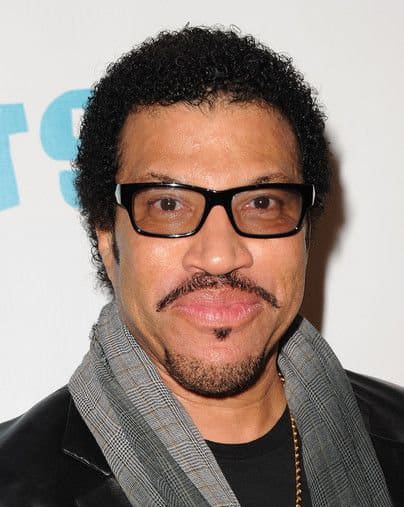 Photo of Lionel Richie hairstyle.