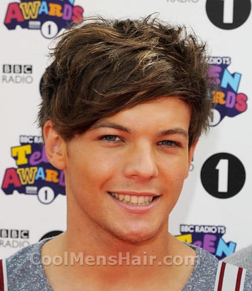 Photo of Louis Tomlinson hairstyle.