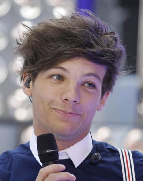 Photo of Louis Tomlinson messy hairstyle.