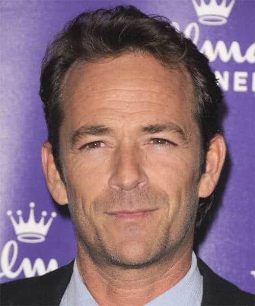 Photo of Luke Perry conservative hairstyle. 