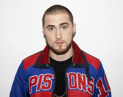 Photo of Mike Posner with cool buzz cut and beard style.