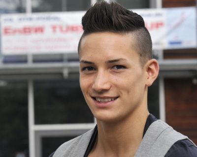 Picture of Marcel Nguyen spiky undercut hairstyle.