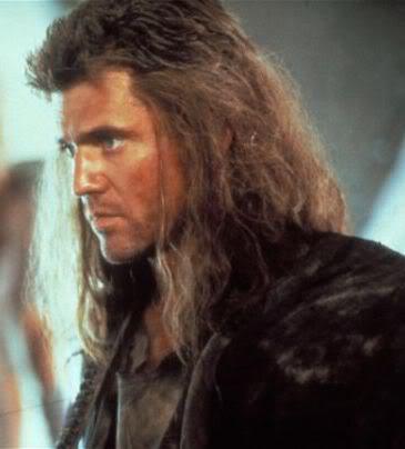 Photo of Mel Gibson long hair in Mad Max.