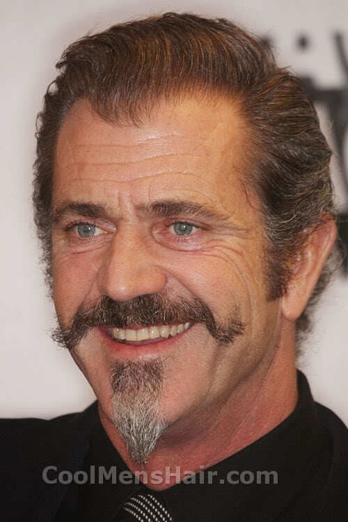 Mel Gibson with mustache and goatee.