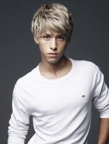 Photo of Mitch Hewer medium length bed head hairstyles. 