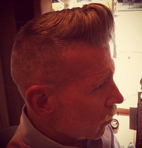 Photo of Nick Wooster pompadour hair.