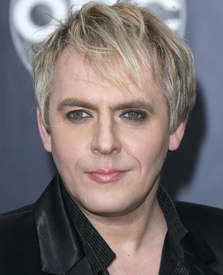 Nick Rhodes messy blond hairstyle.