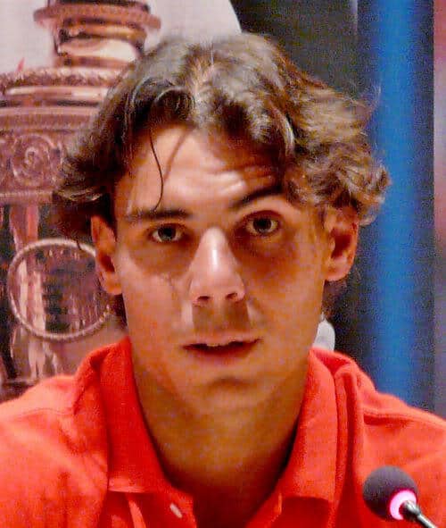 Photo of Rafael Nadal short hair style.