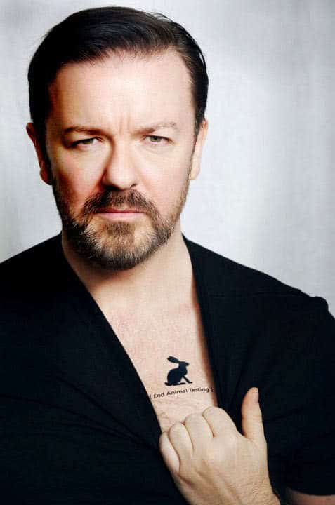 Photo of Ricky Gervais conservative side parted hairstyle.