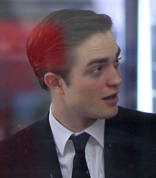 Image of Robert Pattinson slick back hairstyle.