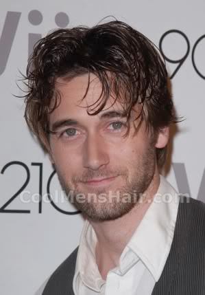 Picture of Ryan Eggold messy hairstyle.