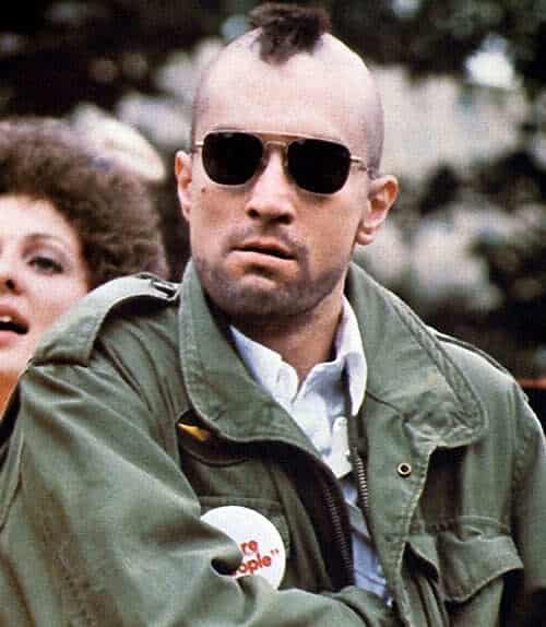 Photo of Travis Bickle with mohawk hair and aviator sunglasses.