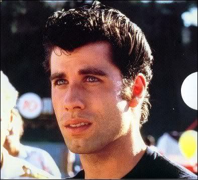 John Travolta's Pompadour Hair. 
