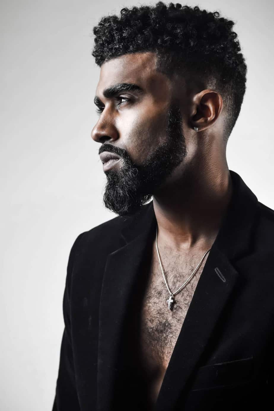 black men curly under cut hairstyle