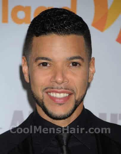 Picture of Wilson Cruz short hair.