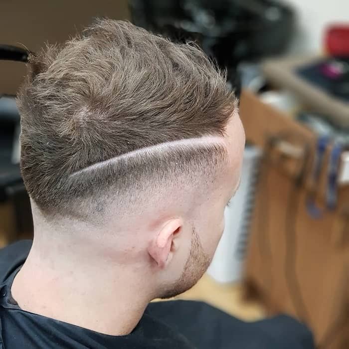 haircut with 3 lines on side