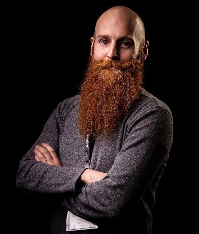 bald men with long ginger beard