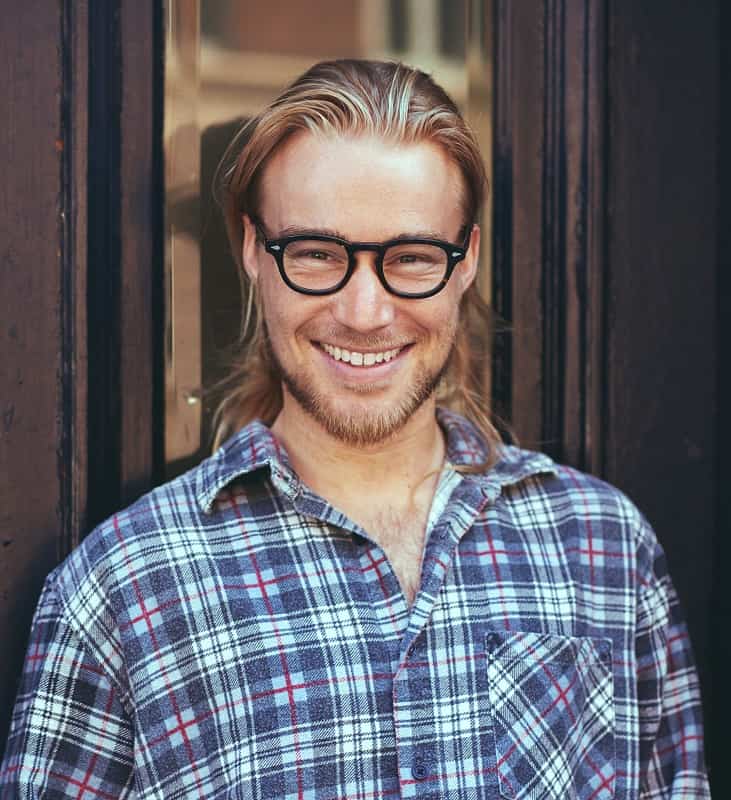 balding long hairstyle for men with glasses