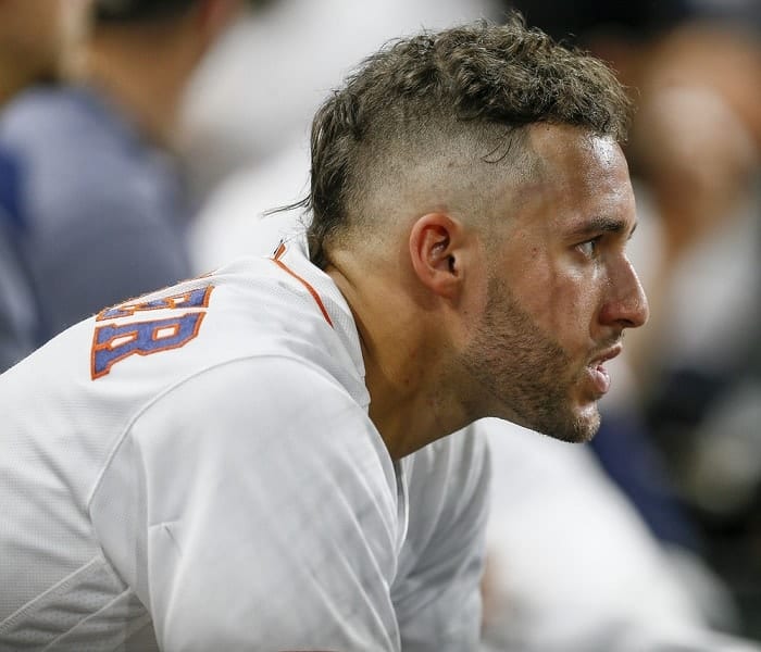 baseball player with wavy mohawk style