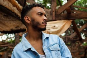 15 Excellent Curly Haircuts for Black Boys + Styling Tips