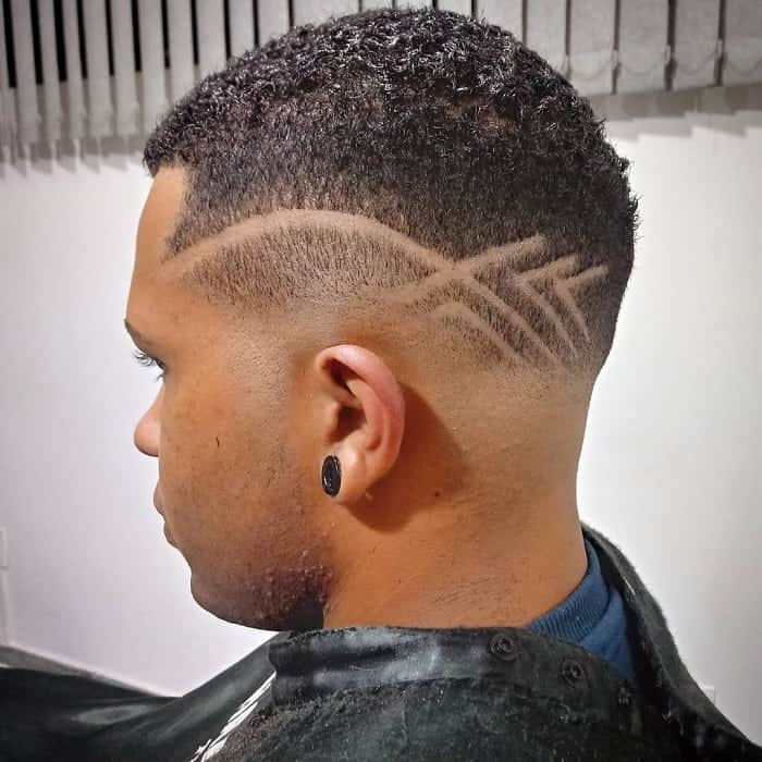 black fade haircut with design