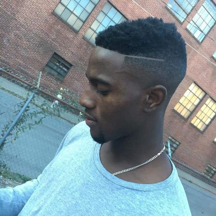 black fade haircut with line