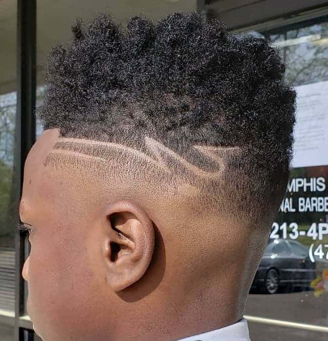 wavy hairstyle with design for black men