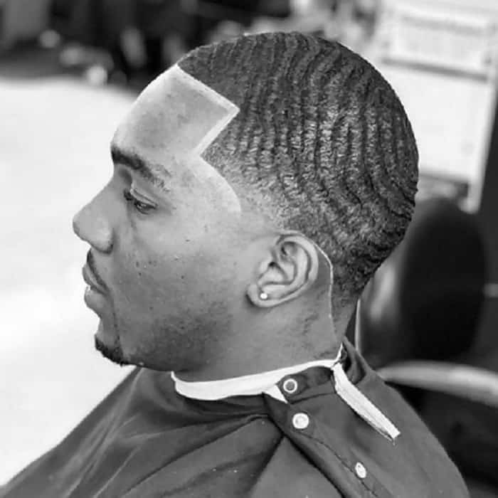 black men temple fade haircut with waves